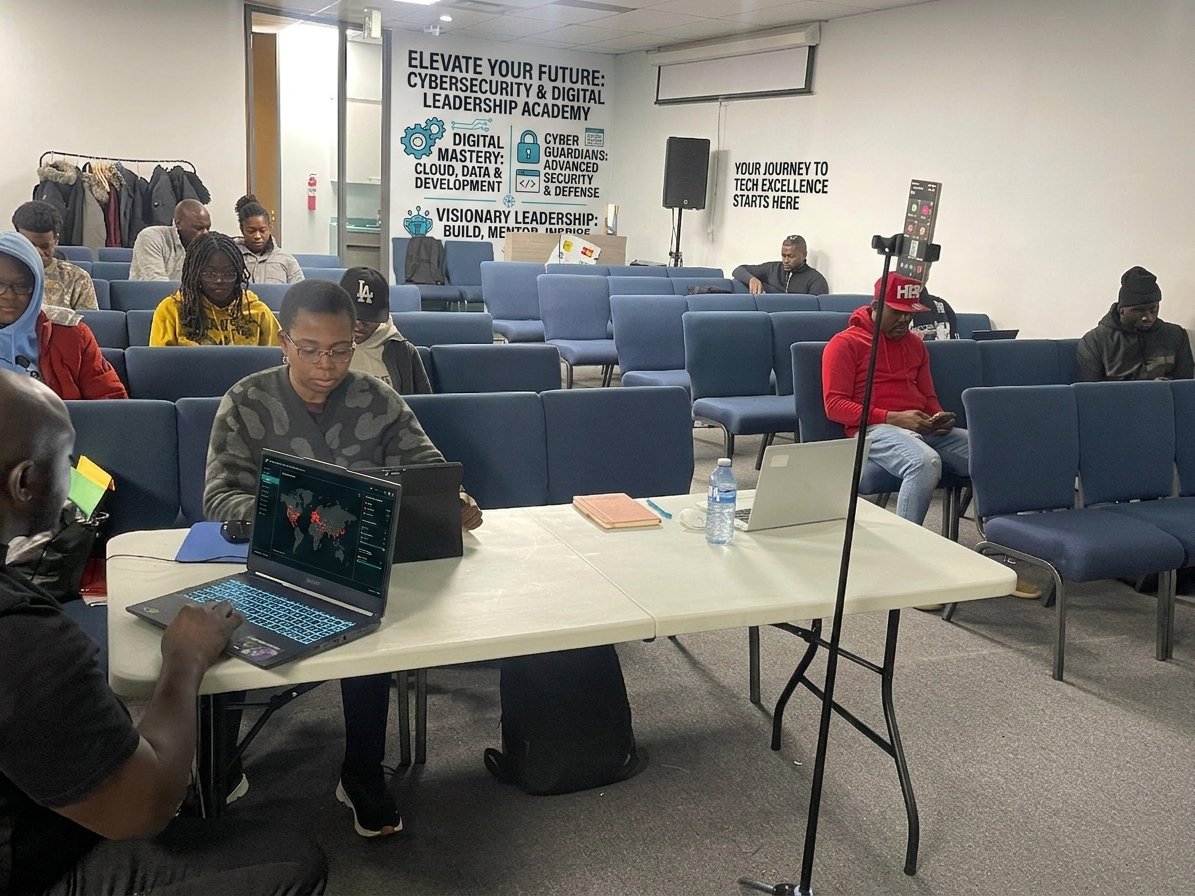 Youth working on laptops during a CyberLearn Durham cybersecurity session
